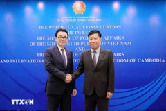 El viceministro de Relaciones Exteriores de Vietnam, Nguyen Manh Cuong, y el secretario de Estado del Ministerio de Asuntos Exteriores y Cooperación Internacional de Camboya, Ung Rachana. (Fuente: VNA)