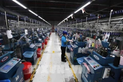 La compañía SUNJIN AT&C VINA en la zona económica de Chan May - Lang Co, ciudad de Hue con 100% del capital sudcoreano, se especializa en la fabricación de productos de punto para exportación. (Foto: VNA)