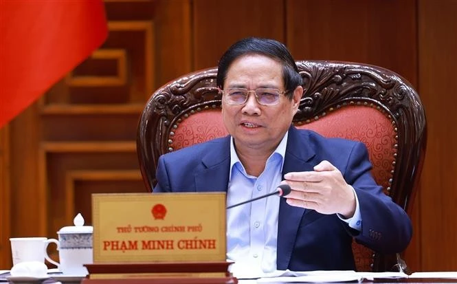 El primer ministro de Vietnam, Pham Minh Chinh, preside la reunión (Foto: VNA)