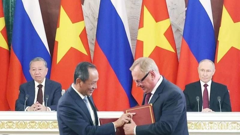 Acto de rúbrica (Foto: nhandan.vn)