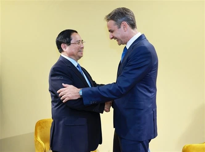 El primer ministro de Vietnam, Pham Minh Chinh (izquierda), y su homólogo griego, Kyriakos Mitsotakis (Foto: VNA)