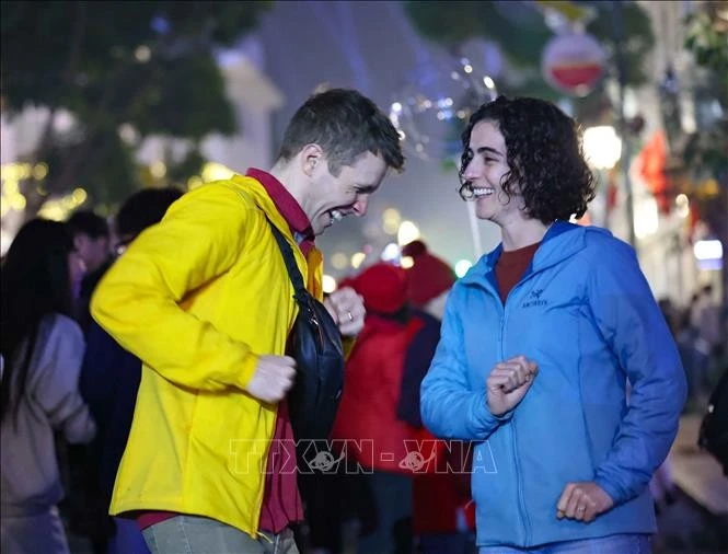 Los extranjeros celebran el Año Nuevo en Hanoi. (Foto: VNA)