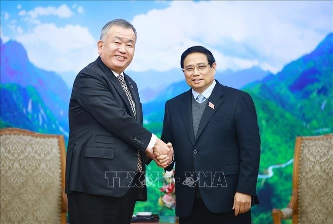 El primer ministro de Vietnam, Pham Minh Chinh (derecha), recibe al director ejecutivo y presidente de Yamato Holdings, Nagao Yutaka (Foto: VNA)