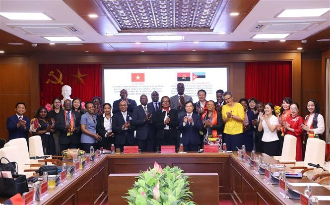 Delegados participantes en la ceremonia de clausura (Foto: VNA)