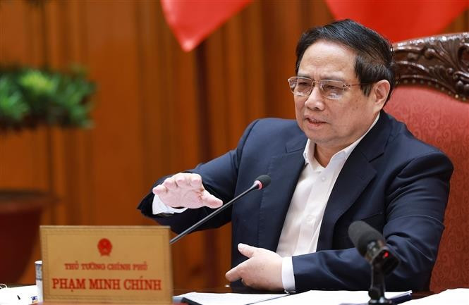 El primer ministro de Vietnam, Pham Minh Chinh, preside la reunión (Foto: VNA)