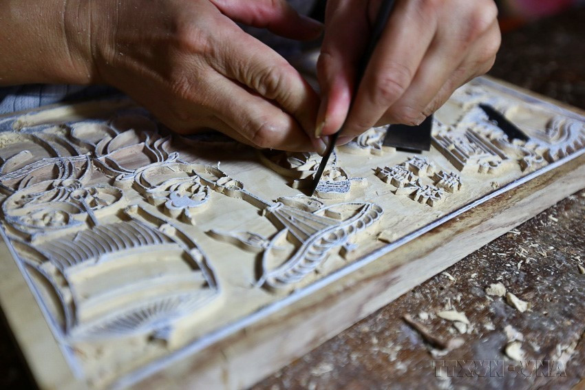 Los bloques de madera para imprimir las pinturas Dong Ho se dividen en dos tipos: bloques para líneas y para colores. (Foto: VNA)