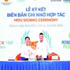 Firma de un Memorando de Entendimiento sobre cooperación entre Becamex VSIP Binh Dinh y CNG Vietnam. (Foto: nhandan.vn)