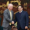 El primer ministro de Vietnam, Pham Minh Chinh, recibe a Yan Jiehe, fundador del grupo China Pacific Construction. (Fuente: VNA)