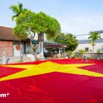 80.º aniversario del Día Nacional: Aldeas de Hanoi se tiñen de rojo con banderas nacionales