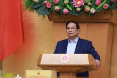 El primer ministro de Vietnam, Pham Minh Chinh, interviene en la reunión. (Fuente: VNA)