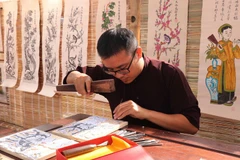 Padres acercan a sus hijos al arte tradicional para preservar identidad vietnamita