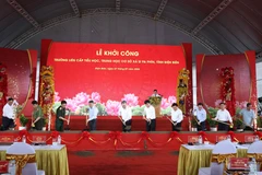 El secretario general del Partido Comunista de Vietnam, To Lam, y delegados en evento. (Fuente: VNA)