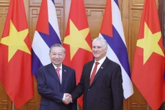 El secretario general del Comité Central del Partido Comunista de Vietnam, To Lam, y el primer secretario del Comité Central del Partido Comunista de Cuba y presidente del país caribeño, Miguel Díaz-Canel Bermúdez. (Fuente: VNA)