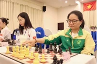 La Gran Maestra Hoang Thi Bao Tram acompaña al equipo vietnamita de ajedrez que participa en el Campeonato del Sudeste Asiático de 2025. (Foto: sggp.org.vn)