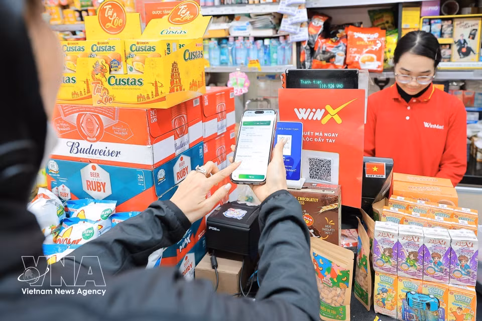 El pago electrónico aumenta la conveniencia, la seguridad y la transparencia de las transacciones. (Foto: VNA)