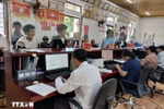 El Centro de Servicios Administrativos Públicos de la comuna Tua Sin Chai, en la provincia de Lai Chau, se ha convertido rápidamente en un punto de referencia cercano y habitual para los residentes locales cada vez que necesitan realizar trámites administrativos. (Foto: VNA)
