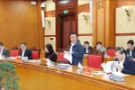 El miembro del Buró Político y miembro permanente del Secretariado y jefe del Subcomité de Organización del XIV Congreso Nacional del Partido Comunista de Vietnam, Tran Cam Tu, habla en el evento (Foto: VNA)
