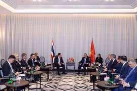 El secretario general del Partido Comunista y presidente de Vietnam, To Lam, recibe al presidente y director ejecutivo del Grupo SCG, Thammasak Sethaudom. (Foto: VN)