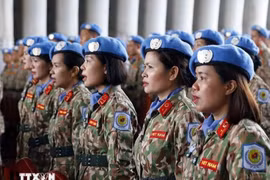 Soldados femeninos de la Unidad de Ingeniería Rotación 2 en una ceremonia antes de partir hacia la misión de mantenimiento de la paz de las Naciones Unidas en Abyei (Foto: VNA)