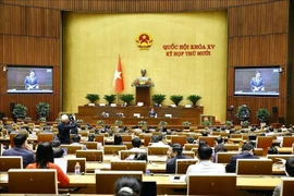 El ministro de Finanzas, Nguyen Van Thang, rinde cuenta ante la Asamblea Nacional. (Foto: VNA)