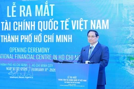 El primer ministro de Vietnam, Pham Minh Chinh, preside el lanzamiento del Centro Financiero Internacional de Vietnam (VIFC) en Ciudad Ho Chi Minh (Foto: VNA)