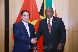 El primer ministro vietnamita, Pham Minh Chinh, y el presidente sudafricano, Cyril Ramaphosa. (Foto: VNA)