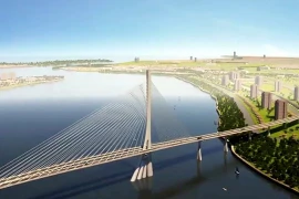 El puente de Can Gio, una estructura de 7,3 kilómetros con una altura libre de 55 metros y una inversión de cerca de 417 millones de dólares, simboliza la aspiración de la ciudad de expandirse hacia el mar. (Foto: VNA)