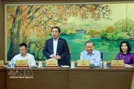 El secretario general del Partido Comunista y presidente de Vietnam, To Lam, en las discusiones grupales. (Foto: VNA)