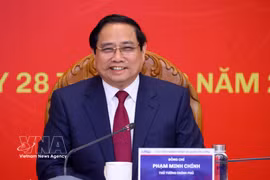 El primer ministro Pham Minh Chinh se dirige a la sesión de trabajo con la Academia de Administración Pública y Gobernanza (APAG). (Foto: VNA)