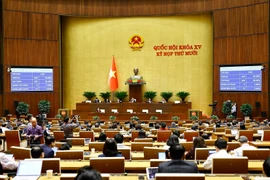 Con la mayoría de votos a favor, la Asamblea Nacional de Vietnam aprueba la Ley de Gestión Tributaria (modificada). (Foto: VNA)