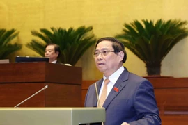 El primer ministro de Vietnam, Pham Minh Chinh, presenta plan para el desarrollo socioeconómico de 2026. (Foto: VNA)