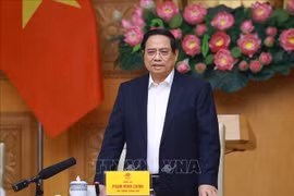 El primer ministro de Vietnam, Pham Minh Chinh, ordena reconstruir todas las casas dañadas por inundaciones. (Foto: VNA)