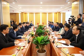 La reunión entre el Ministerio de Construcción de Vietnam y representantes de a Región Autónoma Zhuang de Guangxi (China). (Fuente: Ministerio de Construcción)