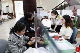 Millones de vietnamitas se beneficiarán de reducción del impuesto sobre la renta en 2026 (Foto: thanhnien.vn)
