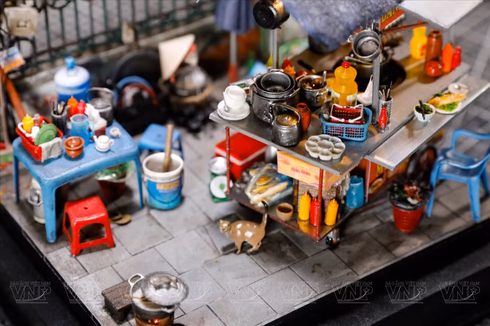 Modelo de un puesto de comida callejera en Hanoi. (Foto: VNA)