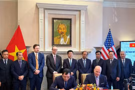 En el acto de firma de acuerdos entre empresas de los dos países. (Fuente: VNA)