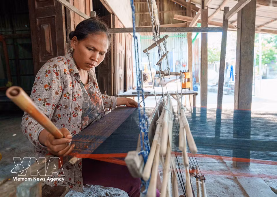 El modelo de desarrollo del turismo comunitario contribuye a preservar los valores culturales tradicionales y a impulsar la economía local. (Foto: VNA)
