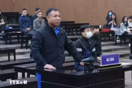Nghiem Quang Minh, de 46 años, propietario del edificio de nueve pisos. (Fuente: VNA)
