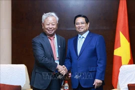 Primer ministro de Vietnam dialoga con líderes de corporaciones chinas