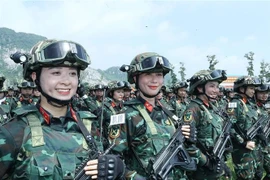 Fuerzas especiales femeninas participan en un entrenamiento conjunto. (Foto: VNA)
