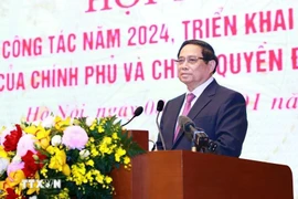 El primer ministro Pham Minh Chinh afirma el compromiso de cumplir con todas las tareas en 2025. (Fuente: VNA) 