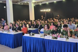 Los delegados participan en el evento. (Fuente: VNA)
