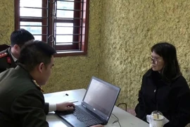 Hoang Thi Hong Thai en la comisaría. (Foto: Policía de Hanoi)