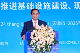 El primer ministro vietnamita, Pham Minh Chinh, habla en el Foro de conexión empresarial Vietnam - China. (Fuente: VNA)