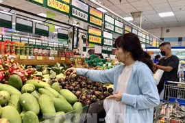 Abundante oferta de fruta nacional en el mercado de Ciudad Ho Chi Minh. (Foto: VNA)