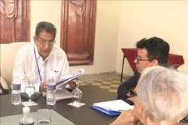 Fredesmán Turró González habla en un seminario sobre las relaciones Vietnam-Cuba. (Foto: VNA)