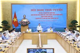 En la reunión. (Foto: VNA)