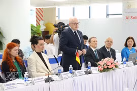Delegados participan en el evento. (Foto: VNA) 