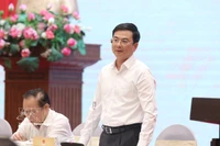 El subgobernador del BEV, Pham Thanh Ha, responde a las preguntas de la prensa. (Foto: VNA)