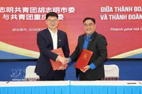 Firma del memorando de entendimiento entre las organizaciones juveniles de Ciudad Ho Chi Minh y de Chongqing (China) (Foto: VNA)